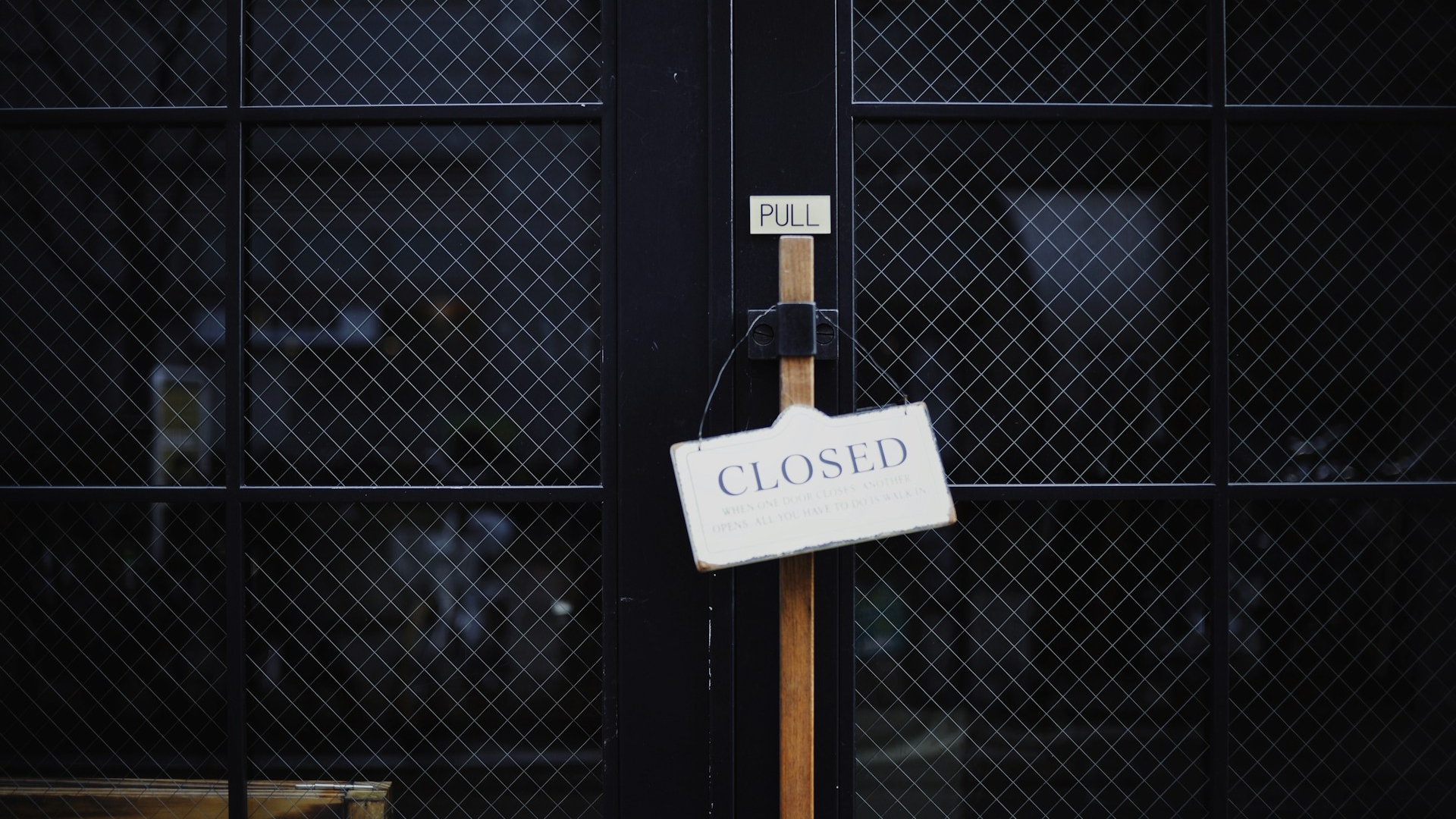 "Closed" sign at door
