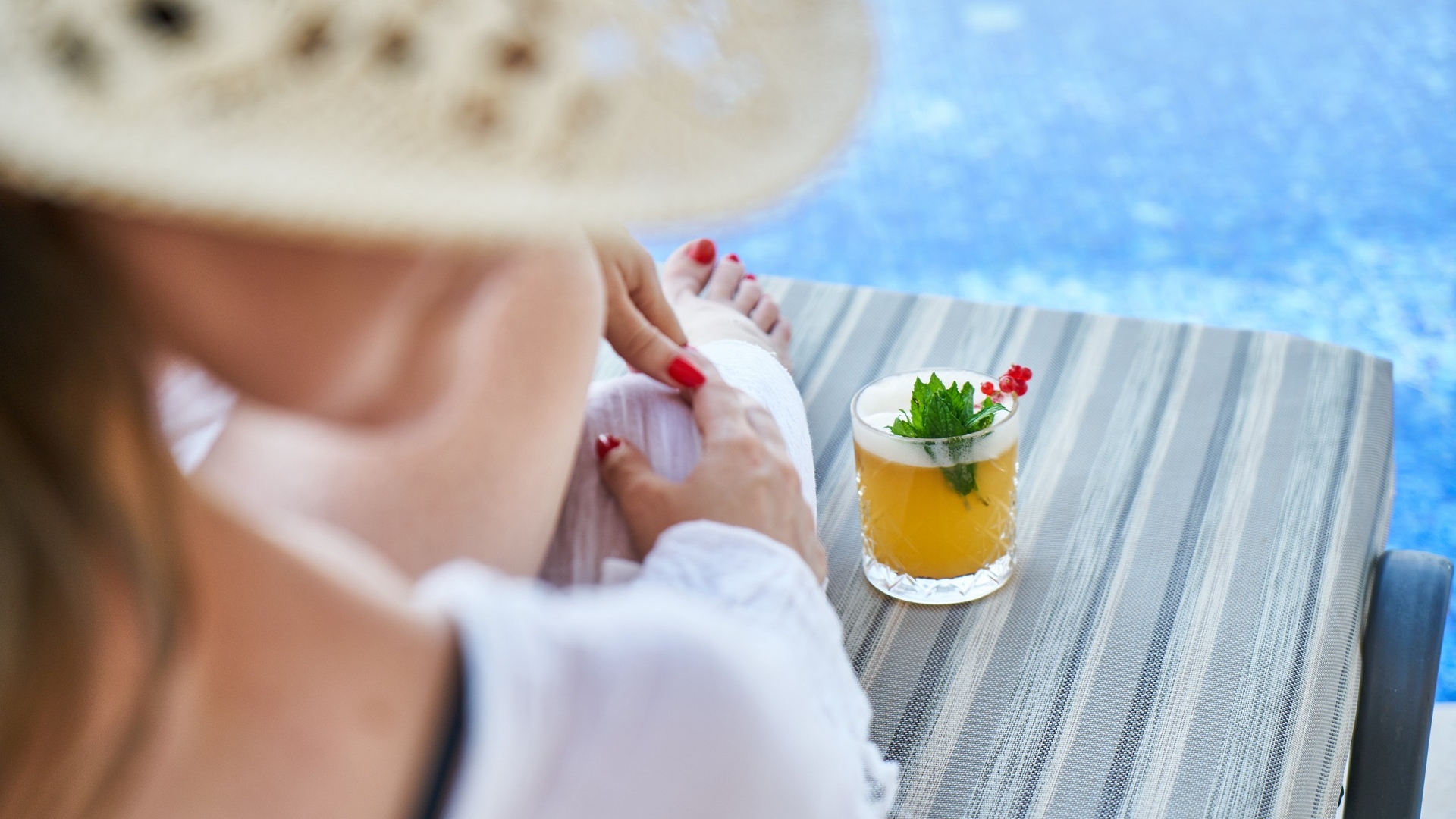 Woman at the Pool with Drink