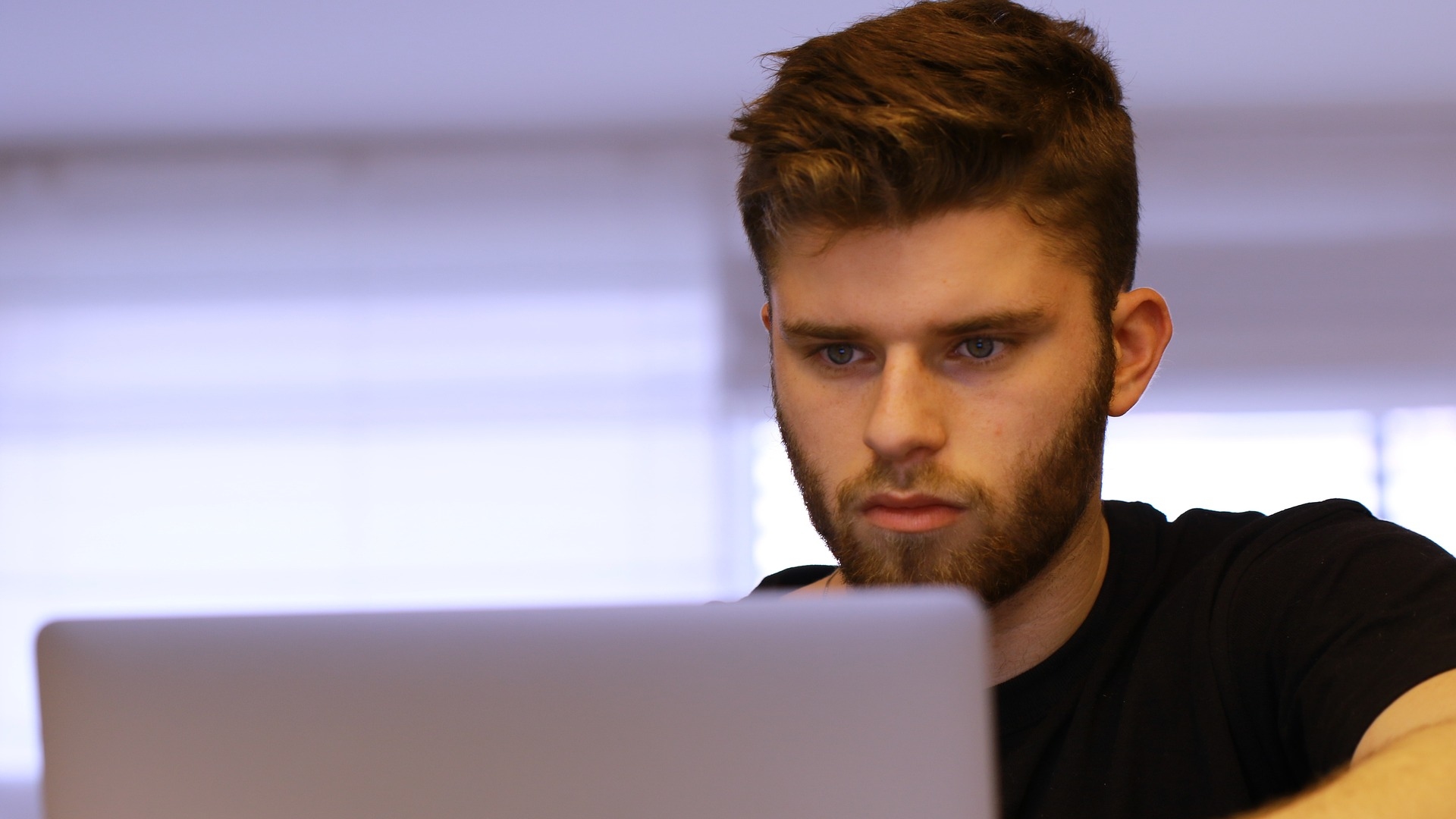 Young man at a Computer